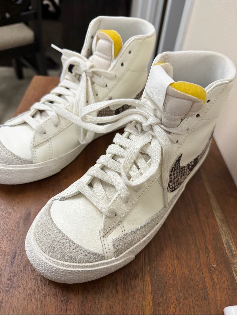 Nike White High-Top Sneakers with Yellow Tongue and Snake-Print Swoosh Accent